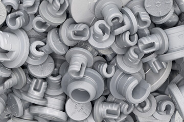 A variety of plastic or rubber stoppers of different sizes for medicine bottles