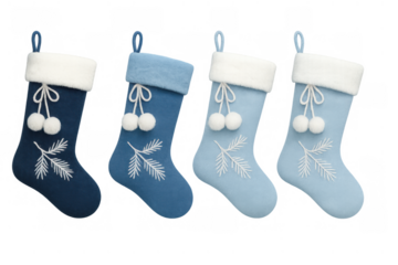 Blue christmas stockings with white cuffs, embroidered fir branches, and pompoms, representing winter holidays and festive decorations