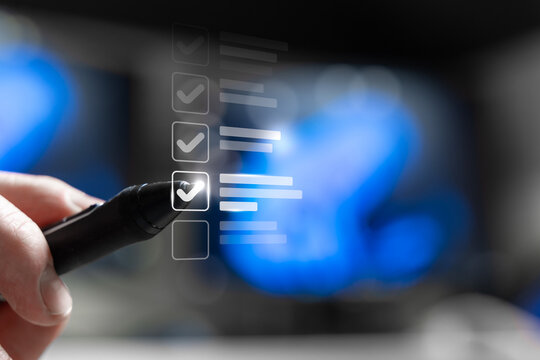 Person Reviewing Digital Checklist And Drawing Check Mark On Completed Task. Office To-Do List. Verification And Compliance Audit With Approval For Quality Process Workflow, Inspection Management