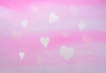 Pink delicate watercolor background with light hearts.