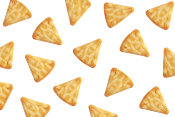 A top-down view of numerous golden brown triangular crackers scattered randomly on a clean white background, creating a simple pattern.