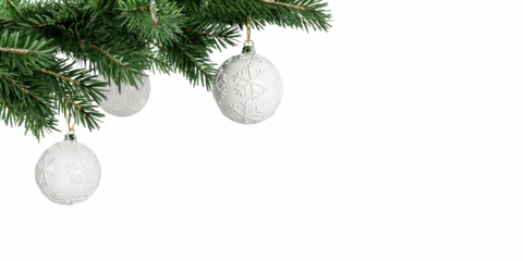 White snowflake ornaments hanging from green pine branches for a festive Christmas decoration