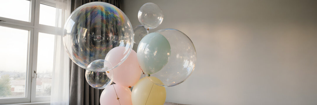 Bouquet of large translucent soap bubbles shaped like balloons floating in minimalist living room - Concept of Surreal Silliness   - Powered by Adobe