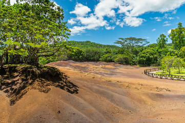 Chamarel Black River Mauritius multicolor clay dunes and green jungle scenery from viewpoint for ecotourism concept