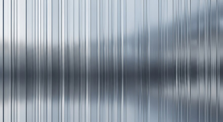 Blurry abstract background with vertical lines in shades of gray and white with a shallow depth of field.