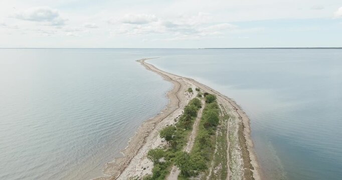 Aerial view of S&auml;&auml;retirp, a narrow peninsula or spit extending into the sea from Kassari island in cloudy spring weather, Hiiumaa, Estonia.