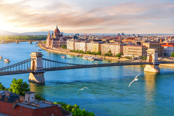 Skyline sunset view of Budapest with Parliament building, Chain Bridge and Danube river, Hungary