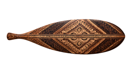 Hawaiian wooden surfboard paddle with carved tribal patterns, isolated on a white background
