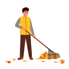 Vector illustration of a cute boy raking leaves. Cartoon scene of a smiling boy dressed in a yellow vest, jacket, pants, raking with a rake of fallen dry autumn leaves isolated on a white background.