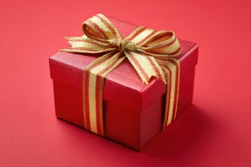 Elegant holiday gift box on red