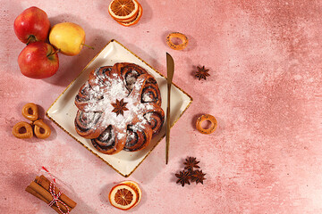 Apple pies, buns, cupcakes with apples, cinnamon, poppy seeds, cranberries, and egg liqueur.homemade delicious dessert,Festive kitchen banner. The concept of festive pastries, seasonal treats