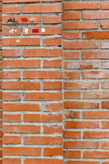 A brick wall where we can appreciate different textures due to the material and some subtle details like a snail. Concept: Textures