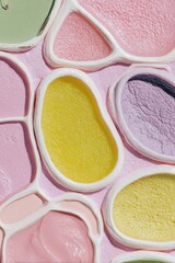 Detailed micrograph with cellular mosaics and fine reticulate lines, combining rounded and elongated forms