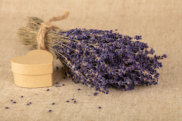 Lavender and heart shaped gift box on canvas