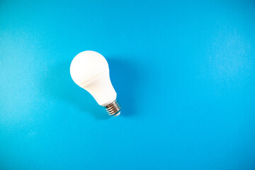 blue light bulb. concept of energy, electricity.