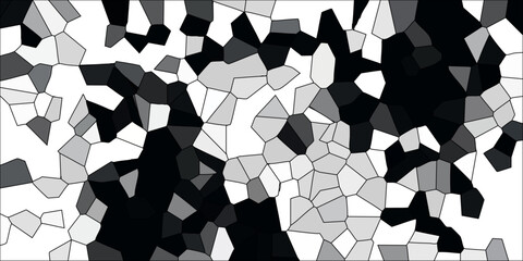 Abstract geometric mosaic pattern with varying shades of gray and black creating a dynamic textured background for design
