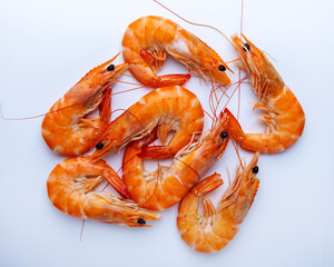 Fresh raw orange shrimps isolated on white background.