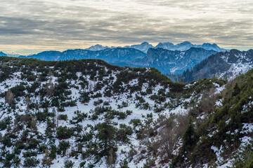 Chiemgau mountain valley landscape close to the Hochfelln peak during winter and autumn season