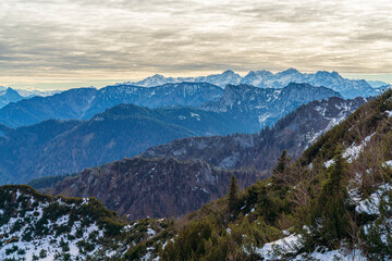 Chiemgau mountain valley landscape close to the Hochfelln peak during winter and autumn season
