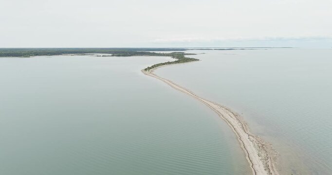 Aerial view of S&auml;&auml;retirp, a narrow peninsula or spit extending into the sea from Kassari island in cloudy spring weather, Hiiumaa, Estonia.
