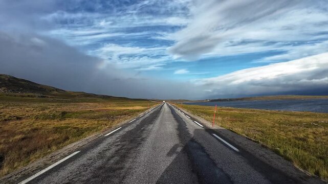 Motorhome driving on a road towards Nordkapp in Norway