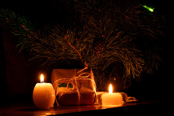 New Year's tree, candles, and a gift wrapped in kraft paper with the Ukrainian flag, a warm, homely glow, a symbol of comfort, hope
