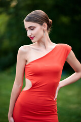 Elegant Slavic Woman in Red Dress Outdoors