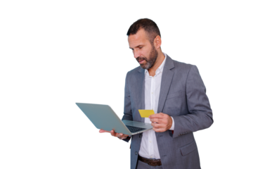 Businessman shopping online holding credit card and laptop for secure digital payment and e-commerce transactions, transparent background