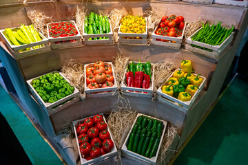 Buying vegetables at the market. Many kinds of vegetables on the local produce fruit and veg...