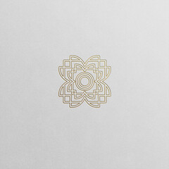 Geometric flower symbol in luxury gold shades isolated on white background.
