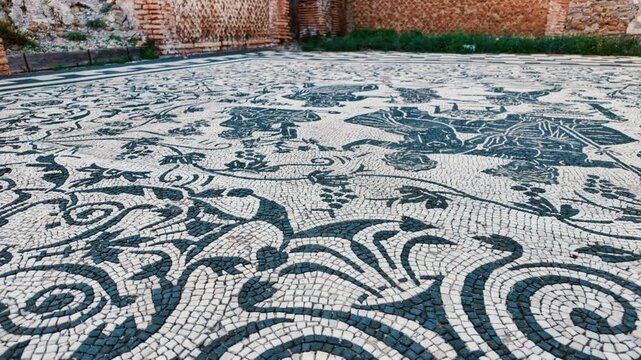 The mosaics of the House of Bacchus and Ariadne or Caseggiato di Bacco e Arianna in Ostia Antica, the old port of Rome, Lazio, Italy, dating back to the 7th century BC