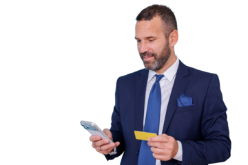Businessman making online payment with credit card and smartphone, shopping, banking, and e-commerce transactions