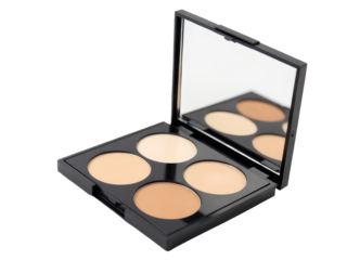 A detailed view of a small makeup palette with multiple colors and textures