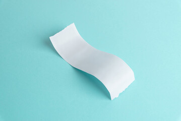 Blank curved paper receipt on blue background, minimalist mockup for expense documents, billing templates, fintech interfaces, and financial design presentations
