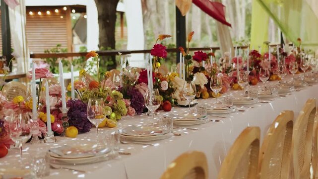 elegant wedding decor, romantic banquet with flowers and candles, chic restaurant wedding table with floral accents and lighting
