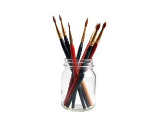 Fototapeta premium A jar filled with various colored paintbrushes, ideal for art studios or creative projects