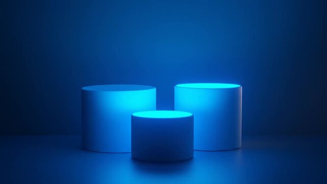 Three cylindrical blue pedestals on a dark blue background with bright blue illumination