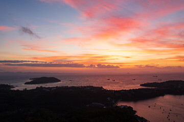 Fototapeta premium Aerial view from a drone of beautiful beach and coastline of Phuket island, Thailand.