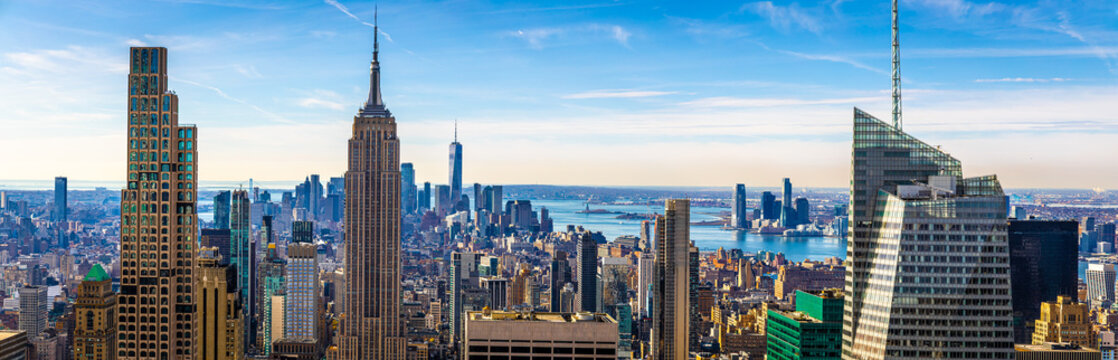 New York City skyline with Empire State Building on clear daytime view