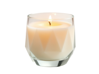 A single white candle lit inside a transparent clear glass container, often used for meditation or as a centerpiece