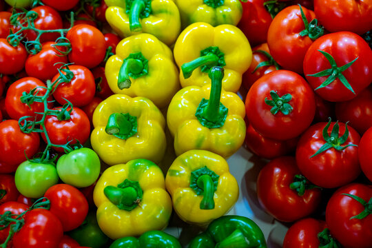 Tri colour pepper selling in super market. Placed with peppers in a market in Antalya Turkey. A top view close up of yellow and red bell peppers. The bell pepper is the fruit of plants in the Grossum - Powered by Adobe