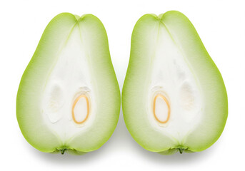 Fresh chayote squash cut in half showing seed isolated on white background
