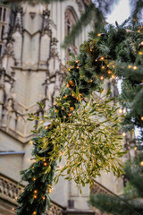 Mistletoe on a fir garland at Christmas Market by the Bern Minster, Switzerland