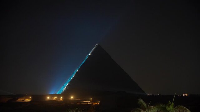 Cairo,Egypt - December 2, 2025:  Illumiated Khufu Pyramid and Khafre's Pyramid in Egypt