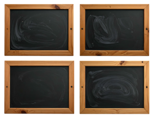 Four vintage chalkboards with smudged writing and wooden frames