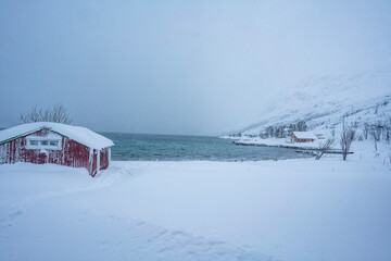 Snow Covered Fjord Village in Tromso,  Norway