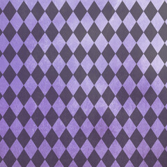 Textured purple and charcoal seamless diamond pattern with vintage paint effect. Elegant geometric background for wallpaper, fabric and branding.