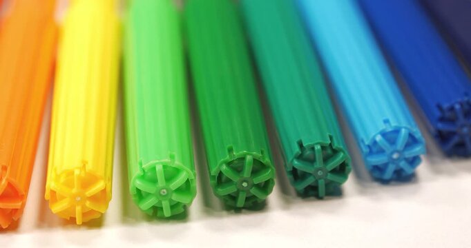Multicolored felt-tip pens for drawing and creativity. Colored plastic felt-tip pens of all rainbow colors