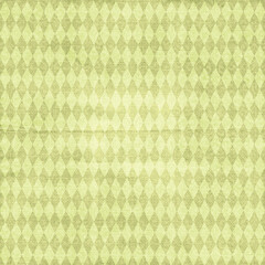 Vintage green diamond-patterned fabric texture with worn effect. Retro seamless-style background for scrapbooking, crafts and decor.