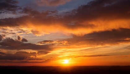 A Breathtaking Sunset Sky With Vibrant Hues Of Orange Red And Gold Featuring Layered Clouds And A Golden Sun